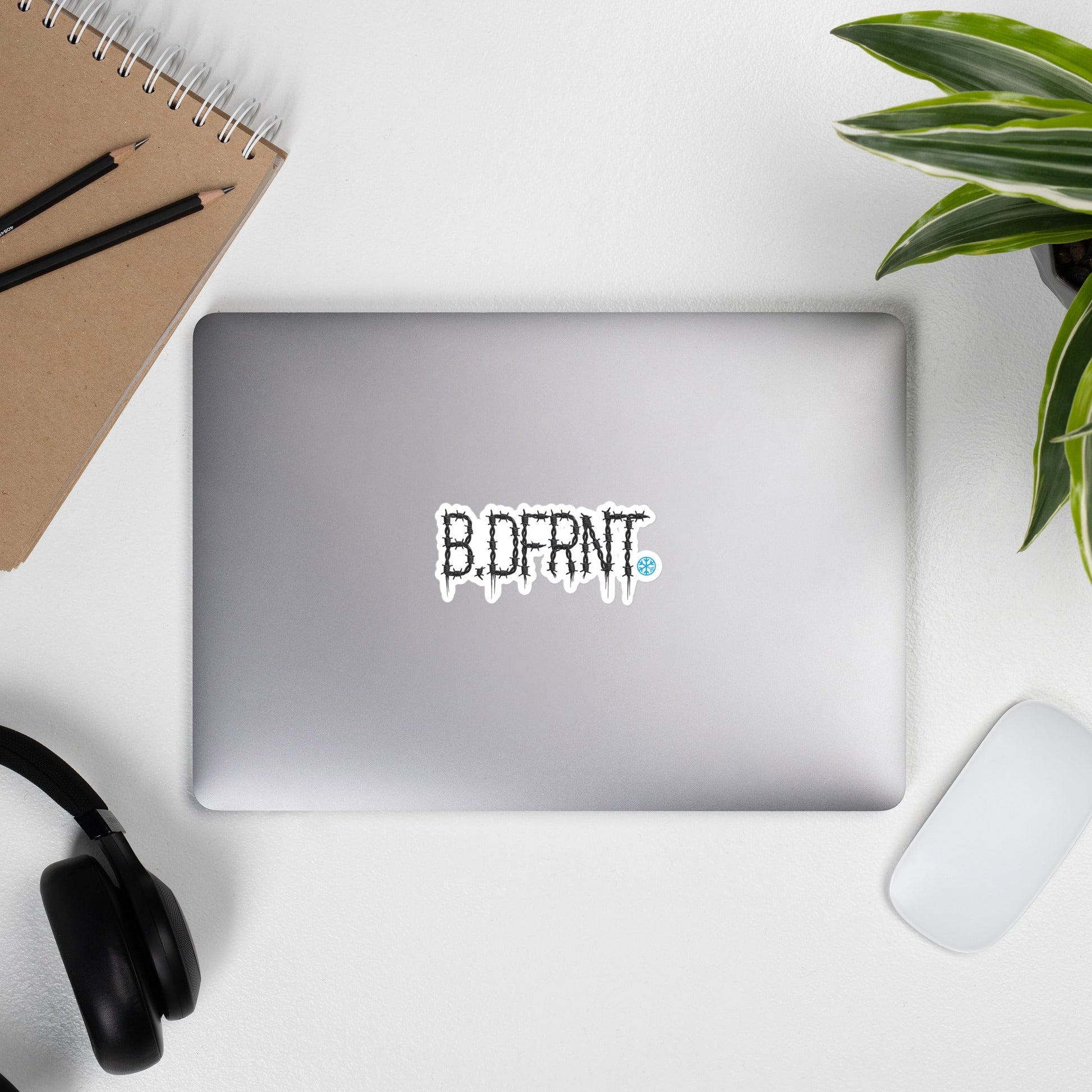 Laptop with B.DFRNT Barbed Wire Sticker from B.Different Clothing, graffiti-inspired streetwear