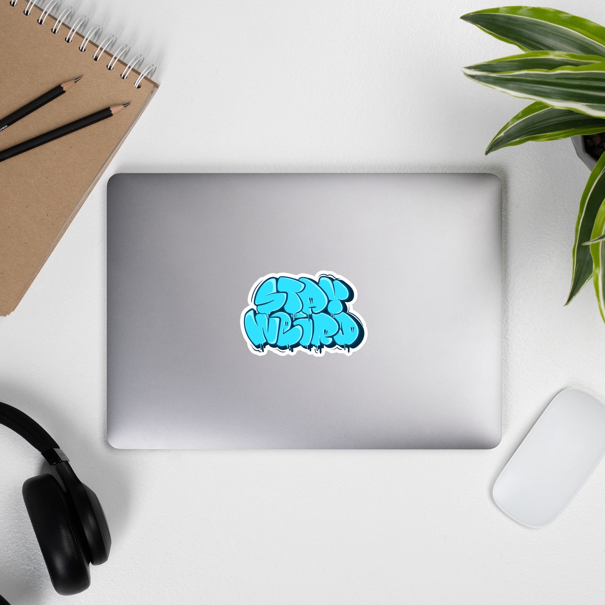 Laptop with Stay Weird Graffiti Throw-up Sticker from B.Different Clothing, graffiti-inspired streetwear
