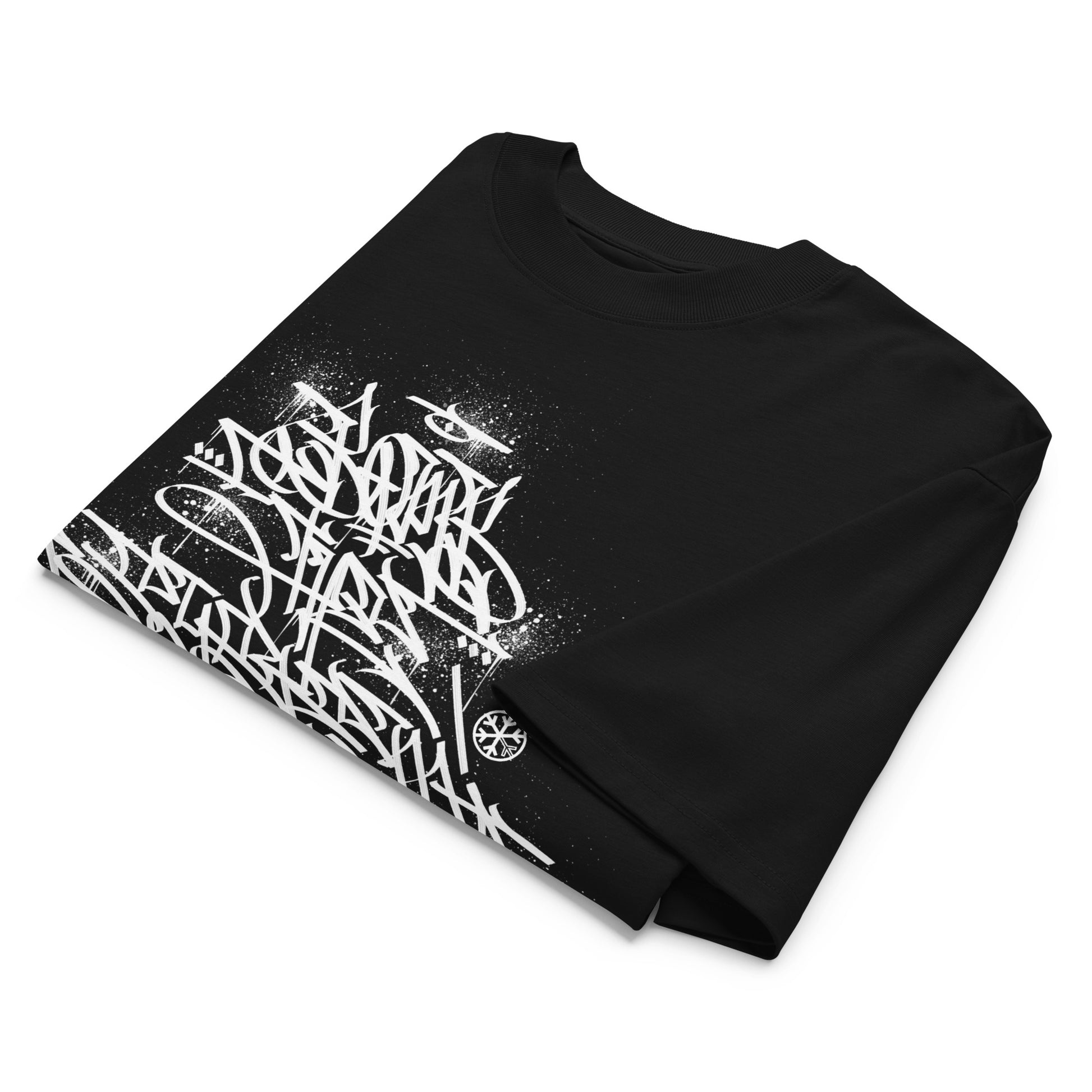 Black-Bomb The System Graffiti Tee by Shew from B.Different Clothing, folded, graffiti-inspired streetwear, oversized heavyweight t-shirt
