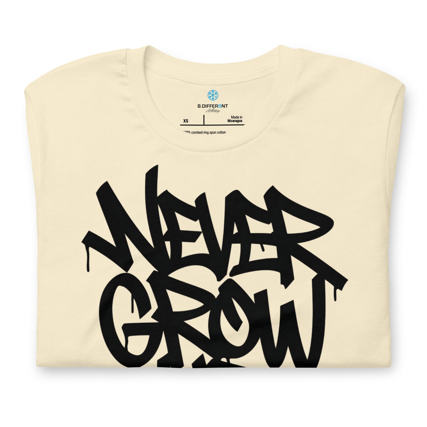 Beige-Never Grow Up Graffiti Tee from B.Different Clothing, folded, graffiti-inspired streetwear t-shirt