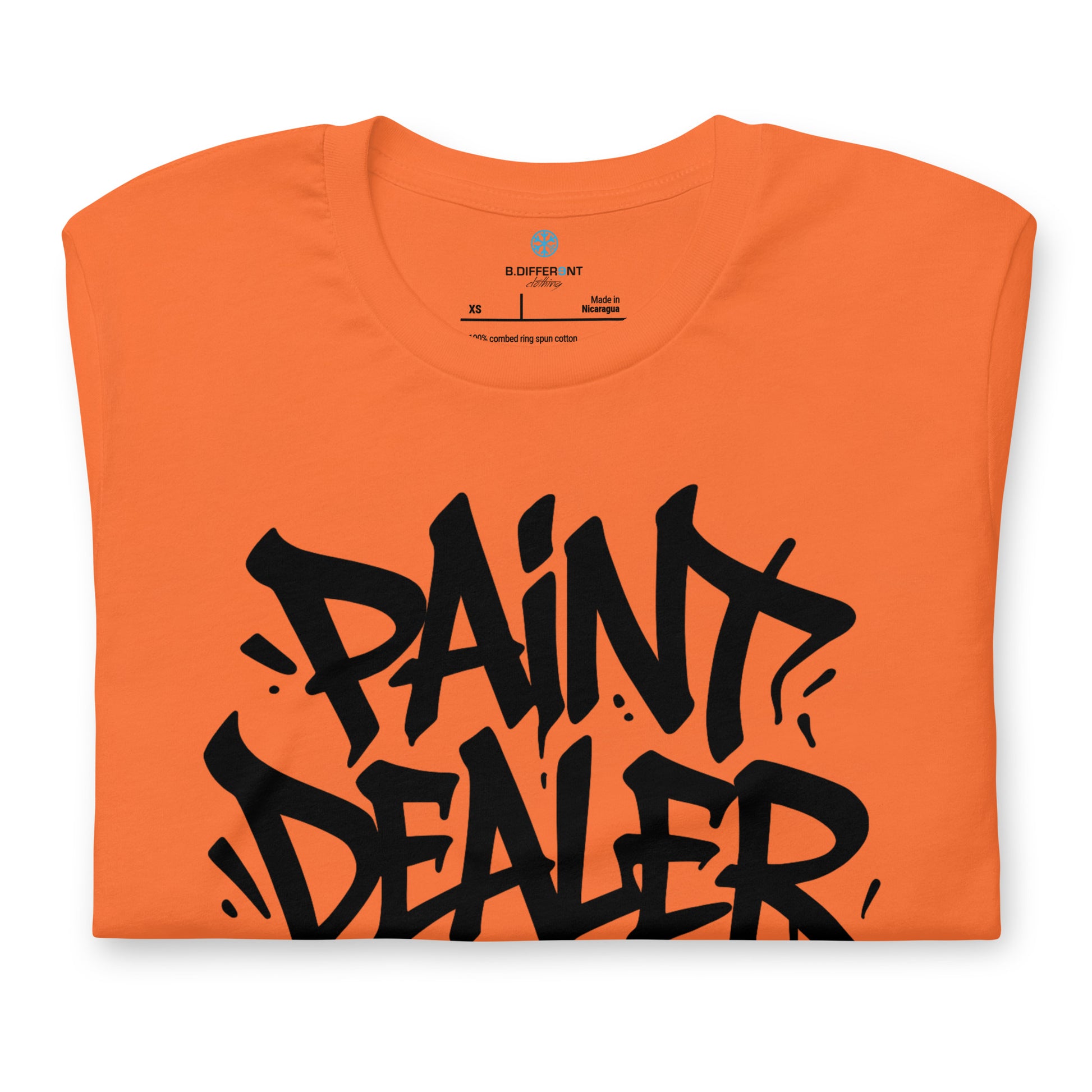 Orange-Paint Dealer Graffiti Tag Tee from B.Different Clothing, folded, graffiti-inspired streetwear t-shirt